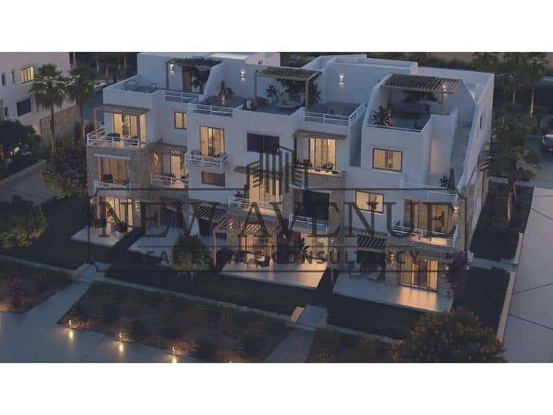 Luxury 2BR Ground Apartment in Encore, Swan Lake El Gouna. Features a private garden, fully finished, overlooking lagoons, developed by Hassan Allam - Vista 2