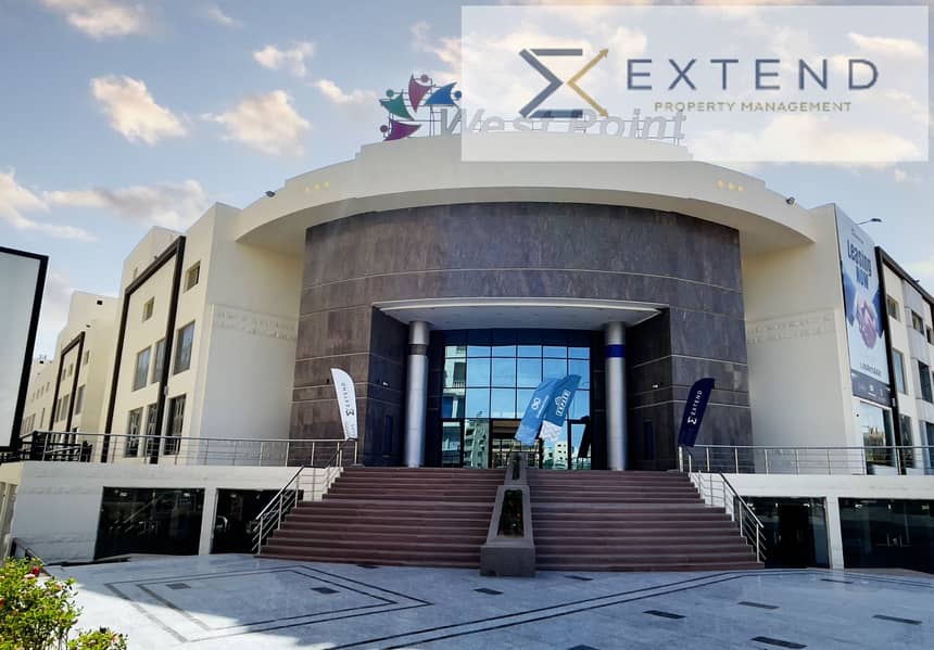 Administrative office for rent with an area of 96.6m inside a commercial mall in the heart of 6th of October on the central axis in front of the University of Culture and Sciences in a prime location - Vista 2