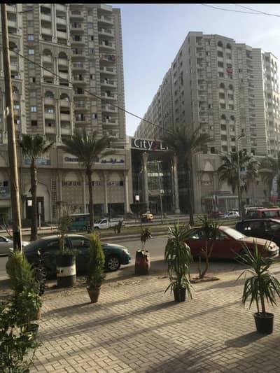 Retail for Rent in Seyouf, Alexandria - للإيجار محل دورين مميز - أمام كارفور سيتي لايت مباشرة*
