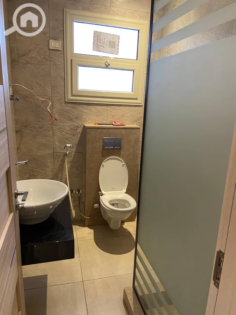 For sale, a first-floor apartment with an elevator in Al Nakheel Compound, New Cairo, next to Swan Lake View Compound, open view. - Ansicht 6