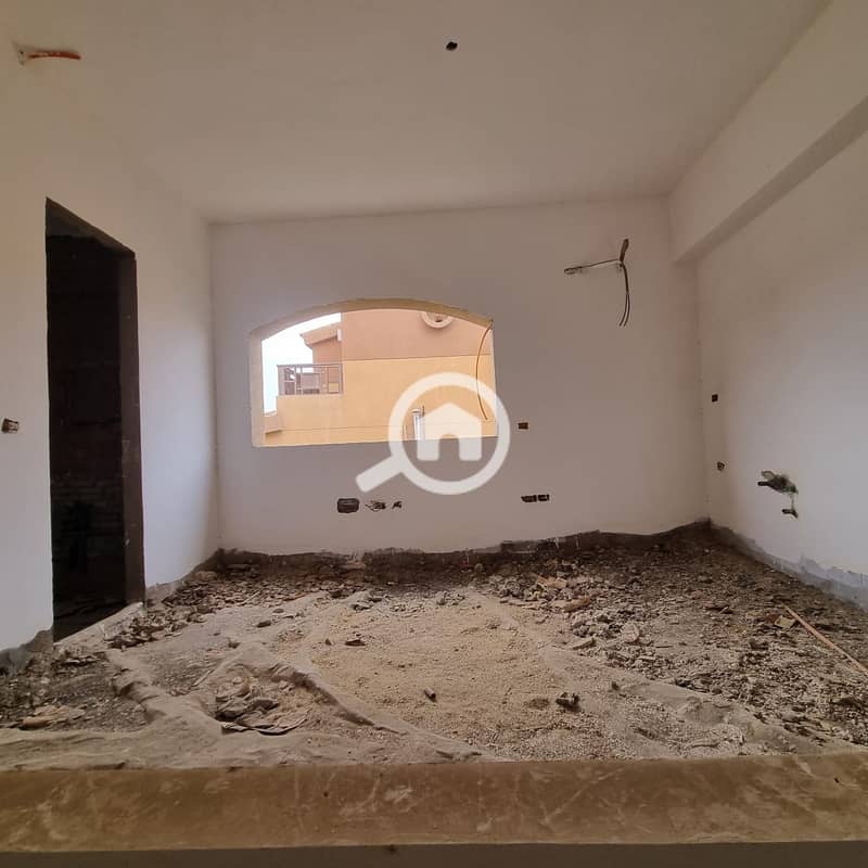 “Corner townhouse for sale with a premium open view in Pyramids Walk Compound, 6th of October City. ” - Mehr