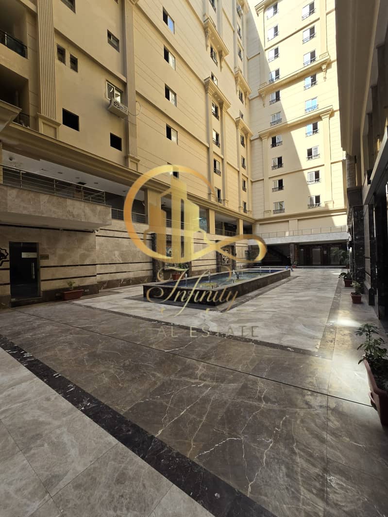 Administrative headquarters for rent with air conditioning only in Al-Hijaz Gran Plaza Tower near the Ring Road, Carrefour, and Fifty Mall, Zahraa Maadi. - Mehr