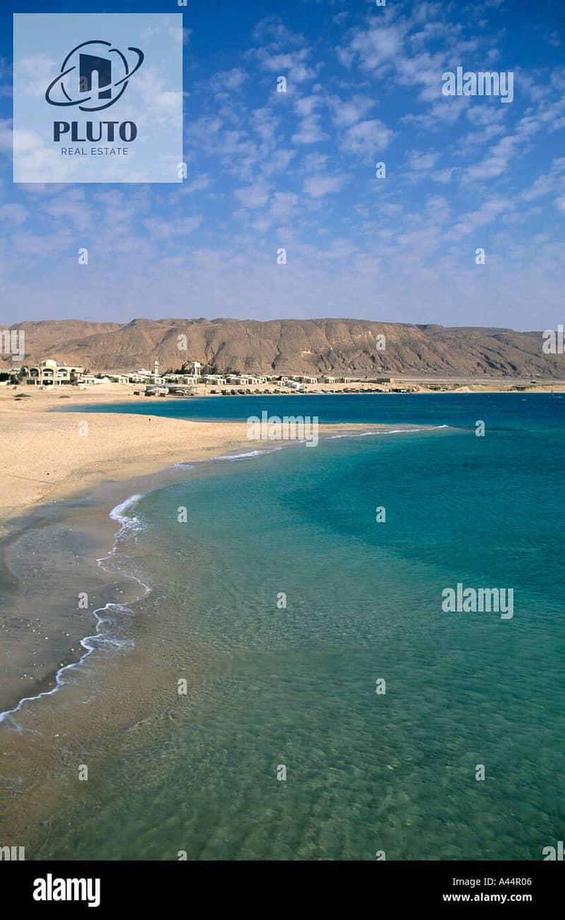 7 clear-waters-of-the-red-sea-lapping-on-an-empty-beach-at-a-ras-sudr-A44R06. jpg