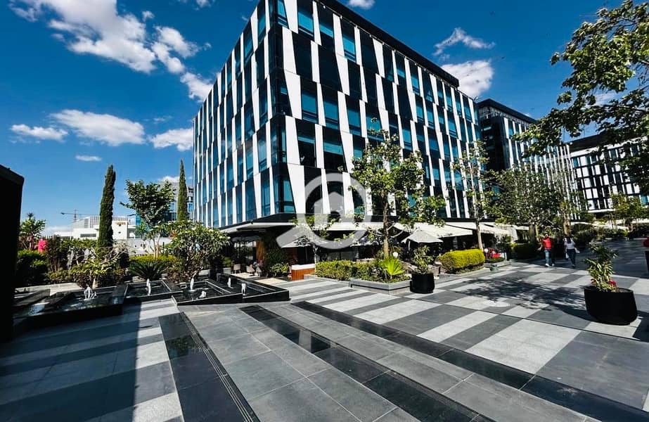 Office Fully finished for rent in park st. 90m el sheikh zayed - Vista 2