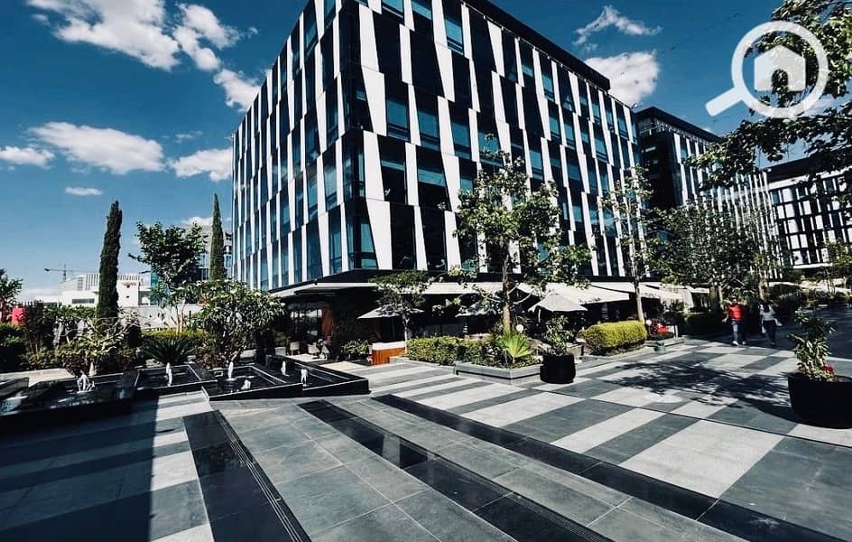Office Fully finished for rent in park st. 90m el sheikh zayed - Vista 3