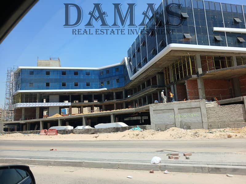 For Sale: 74 sqm office, immediate delivery, 2 rooms and a reception, fully finished with air conditioning, on Gamal Abdel Nasser Axis. - Vista 2