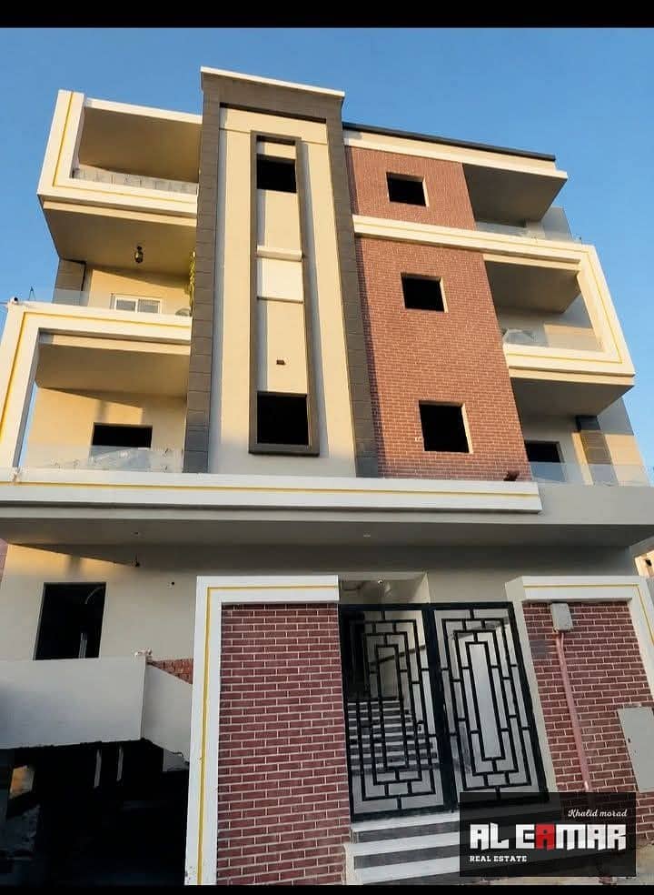 Semi-finished apartment for sale in the First Tourist District, next to Al-Nadi Club, 6th of October City. - Vista 2