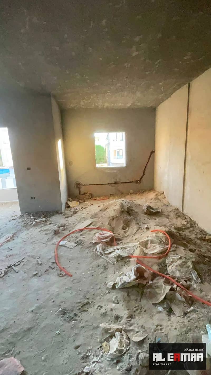 Semi-finished apartment for sale in the First Tourist District, next to Al-Nadi Club, 6th of October City. - Vista 6