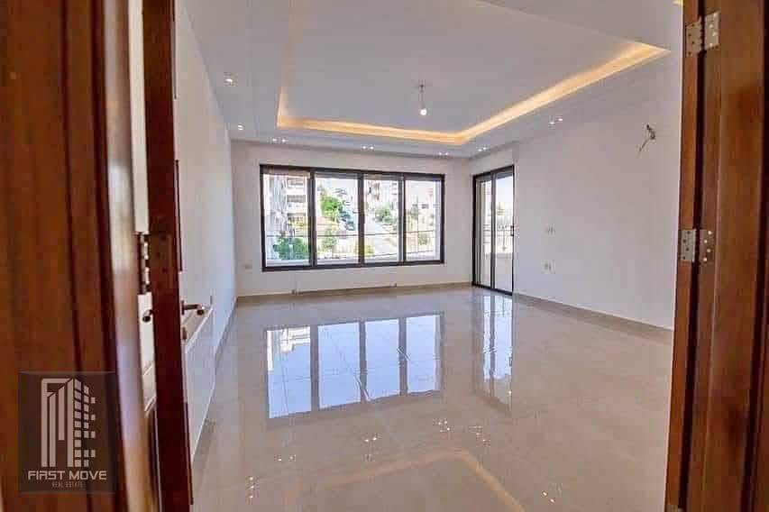 Ready-to-move-in apartment, furnished with air conditioning, at a bargain price, just minutes from the American University in New Garden City, the Administrative Capital R5 - Vista 4