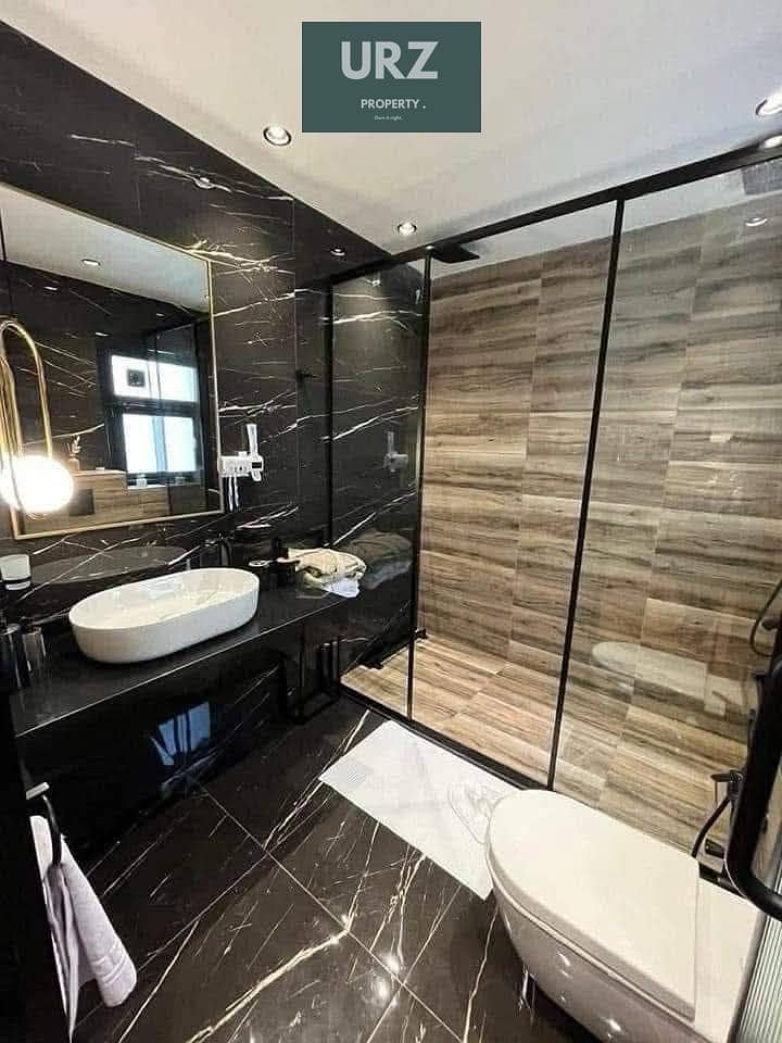 Corner townhouse with a prime layout for sale fully finished with installments over 15 years located on the Suez Road near Al Shorouk Patio Prime and - Bild 4