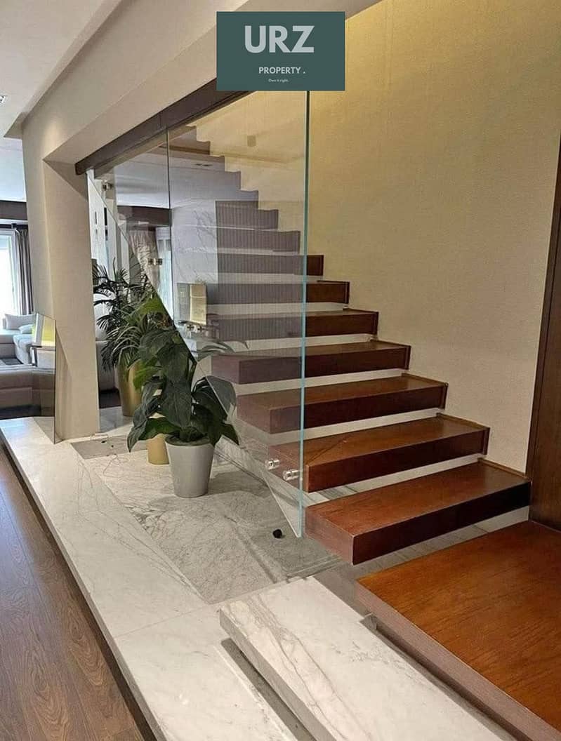 Corner townhouse with a prime layout for sale fully finished with installments over 15 years located on the Suez Road near Al Shorouk Patio Prime and - Fler