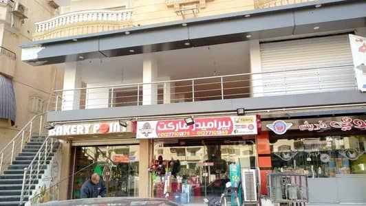 Retail for Rent in Hadayek al-Ahram, Giza - محل للايجار 80م وسط شارع الثروة المعدنية حدائق الاهرام