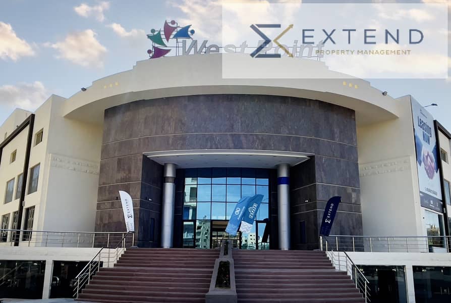 Administrative office for rent inside a shopping mall in front of the University of Culture and Science, on the central axis in 6th of October City, in a prime location. - Aanzicht 2