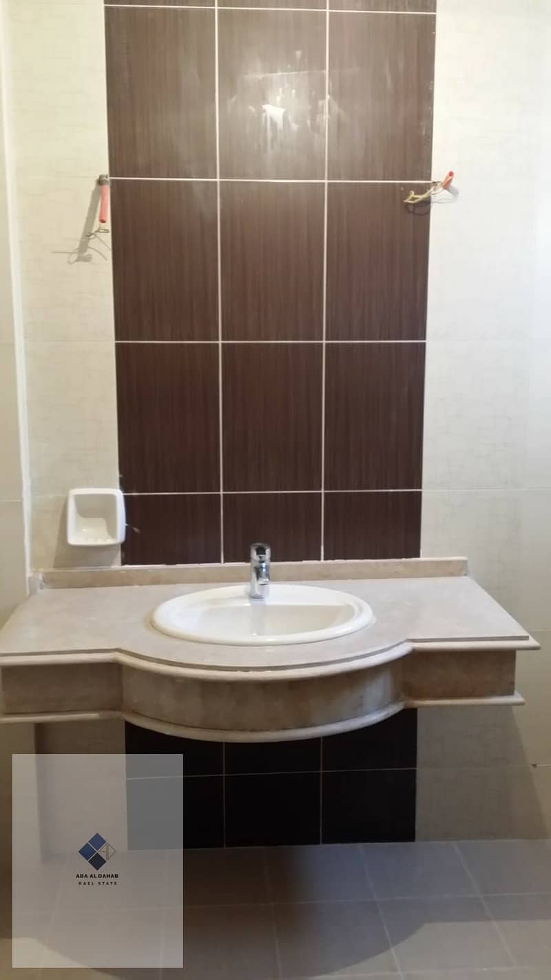 Room for rent in Fifth Settlement – Violet 12, distinctive area, 3 bedrooms, 2 bathrooms on the top floor, with a sea view, and a prime location on a main square. - View 5