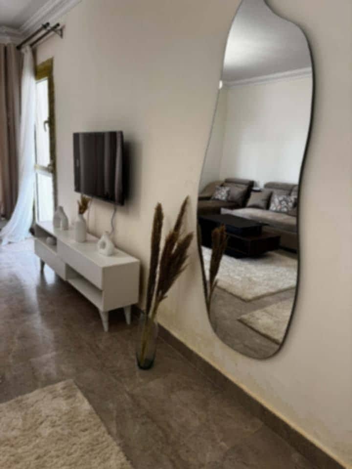 Furnished apartment for rent in Janna Zayed 2, Sheikh Zayed; includes a kitchen, features a prime location, and offers a wonderful view. - Aanzicht 4