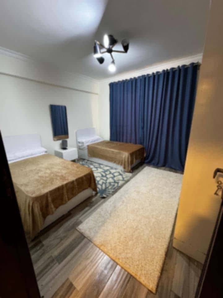 Furnished apartment for rent in Janna Zayed 2, Sheikh Zayed; includes a kitchen, features a prime location, and offers a wonderful view. - Aanzicht 6