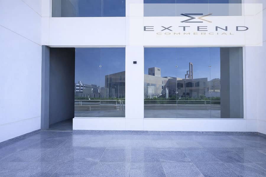 10 Modern building with glass storefront windows. png