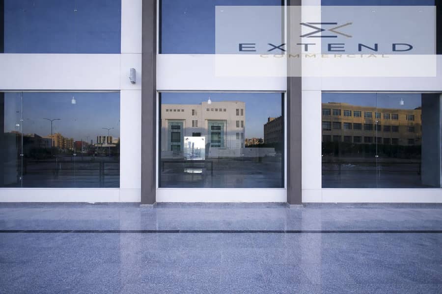 10 Modern commercial building at sunset. png