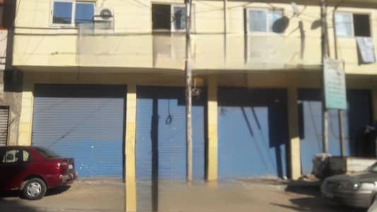 Retail for Sale in Moharam Bik, Alexandria - محل بثلاث أبواب واجهة كبيره في محرم بك