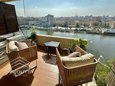 شقة فندقية  للبيع في المعادي، القاهرة - LUX Nile View Zamalek Loft (1). jpg