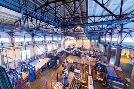 Factory for Rent in Badr City, Cairo - factory-workshop-interior-machines-glass-production-background. jpg Factory for Rent in Badr City, Cairo - factory-workshop-interior-machines-glass-production-background. jpg