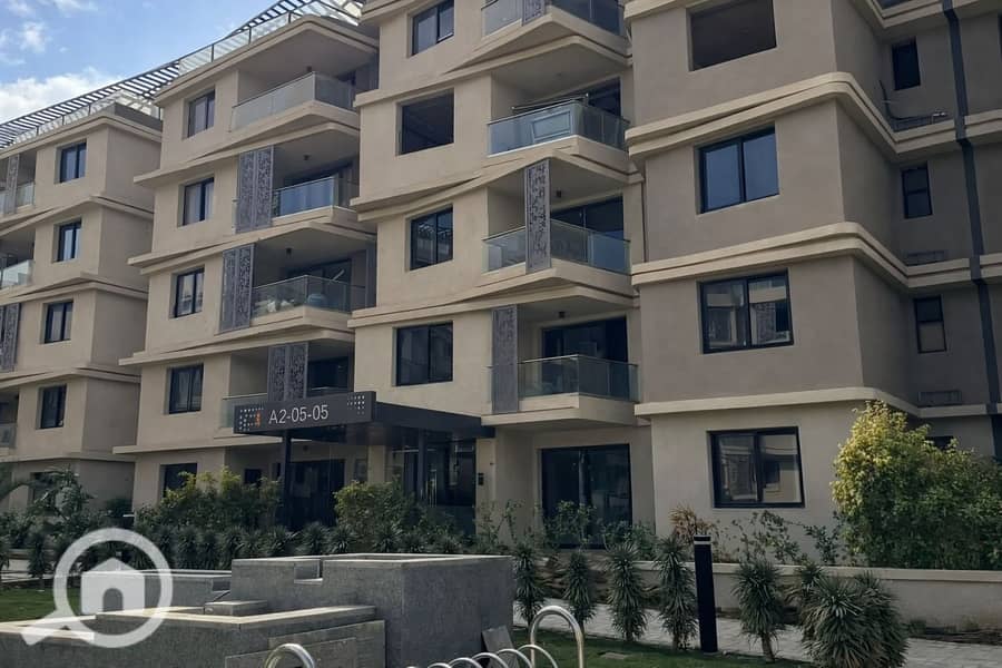 9 Modern apartment complex with landscaped area. png
