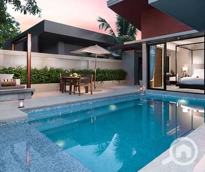 3 Bedroom Townhouse for Sale in Sheikh Zayed, Giza - Deluxe_Pool_Villa_-_Outside_Jacuzzi_and_Swimming_Pool-2. jpg 3 Bedroom Townhouse for Sale in Sheikh Zayed, Giza - Deluxe_Pool_Villa_-_Outside_Jacuzzi_and_Swimming_Pool-2. jpg
