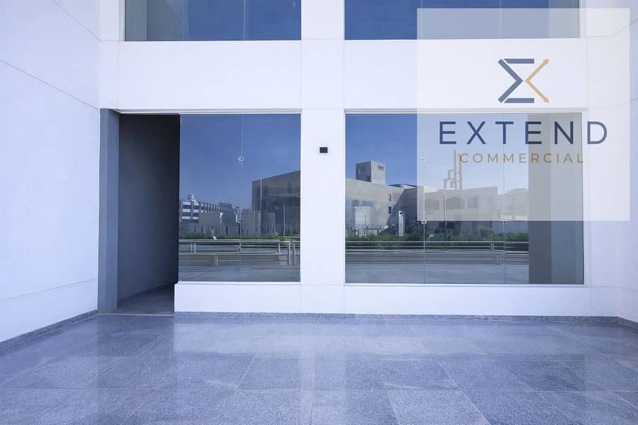 10 Modern building with glass storefront windows. png