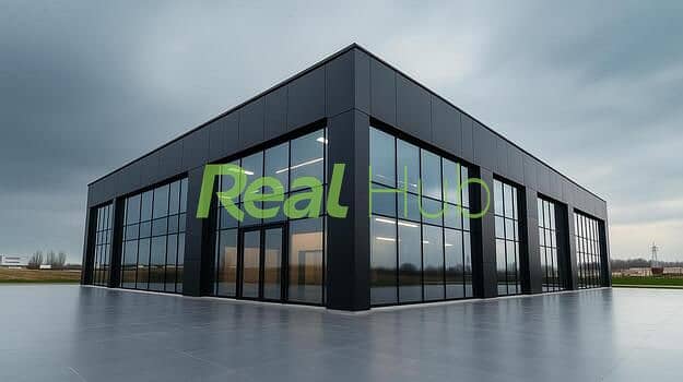 7 modern-glass-building-shines-under-a-cloudy-sky-in-a-rural-area-photo. jpg