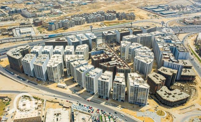 8 Buildings-in-one-Katameya. jpg