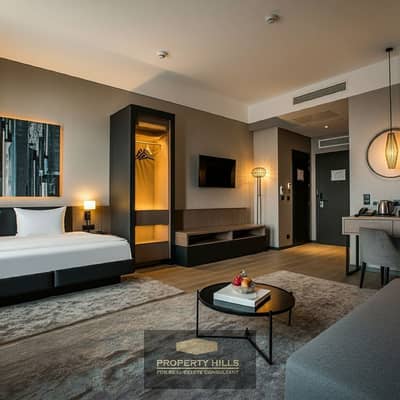 شقة 2 غرفة نوم للبيع في 6 اكتوبر، الجيزة - modren guest room with unique designs,wall paneling and innovative lights. jpeg