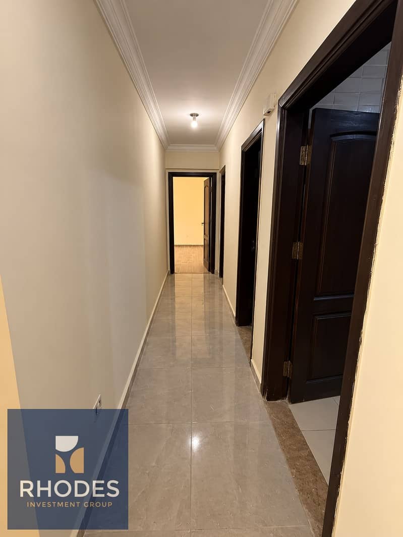 10 Warm Marble Hallway with Dark Wood Doors (1). png
