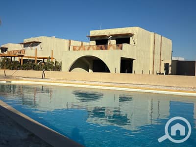 5 Bedroom Chalet for Sale in North Coast, Matruh - 7932c53a-b1f3-4f73-85dd-1d5f7f1aaf12. jpg 5 Bedroom Chalet for Sale in North Coast, Matruh - 7932c53a-b1f3-4f73-85dd-1d5f7f1aaf12. jpg