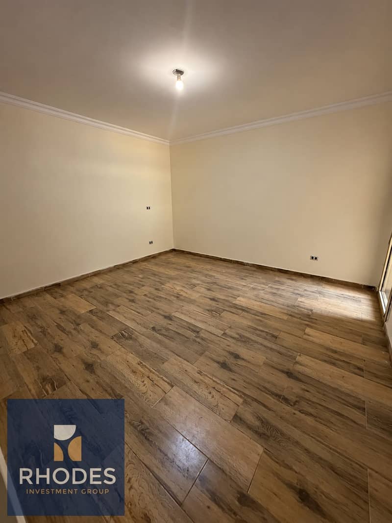 4 Empty Cream Room with Wood-Look Flooring. png