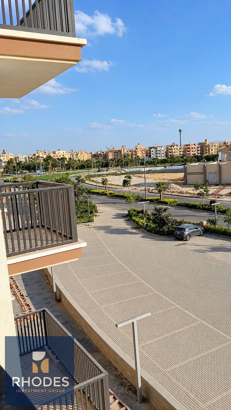5 Sunlit Residential Courtyard View. png