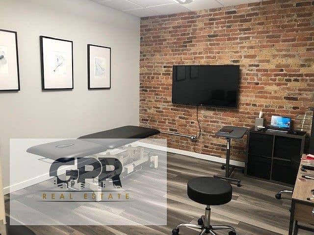 4 Chiropractic Adjustment Area with Exposed Brick. jpeg