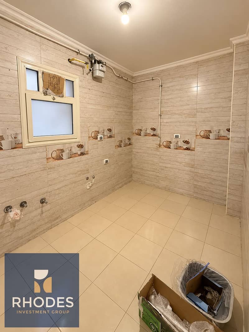 6 Warmly Lit Renovated Utility Room. png