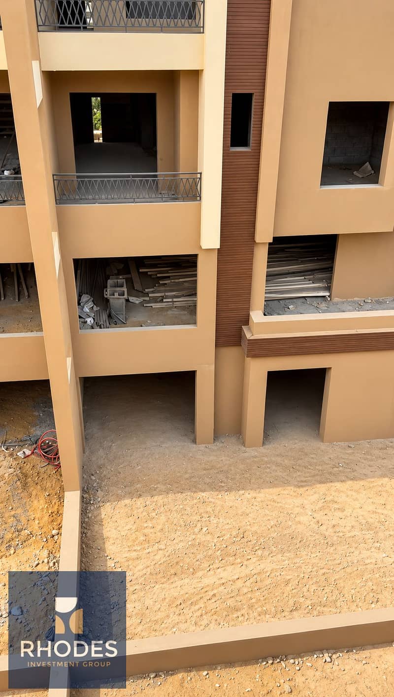4 Modern Apartment Building Under Construction. png