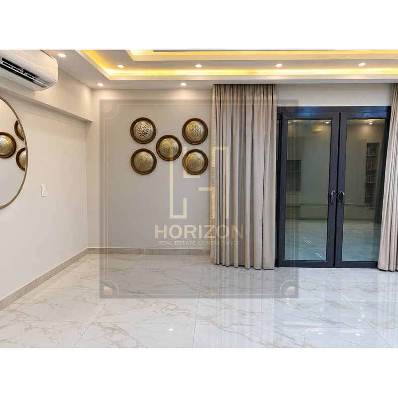 3 Minimalist Marble Interior with Arabic Wall Art. jpg