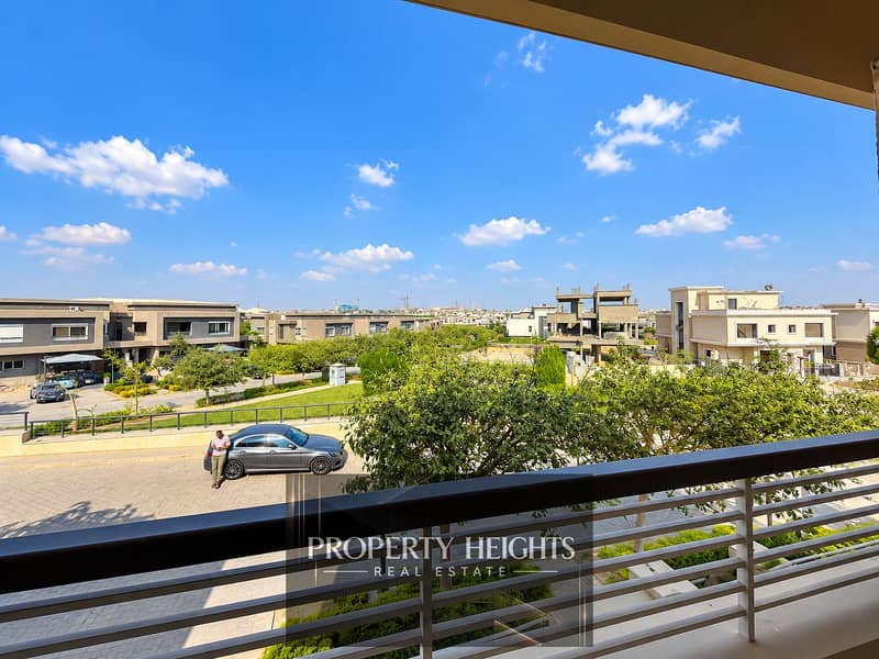 2 Sunny Suburban Villas from a Balcony. png