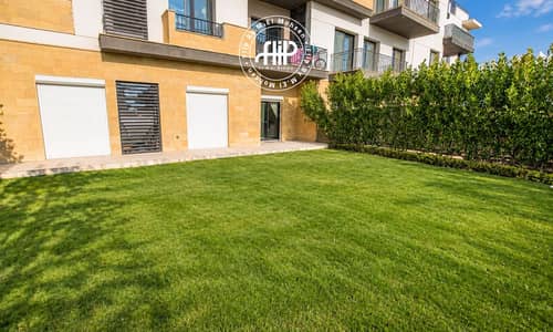 3 Bedroom Flat for Rent in Sheikh Zayed, Giza - Modern Garden Courtyard and Apartment Facade. png 3 Bedroom Flat for Rent in Sheikh Zayed, Giza - Modern Garden Courtyard and Apartment Facade. png