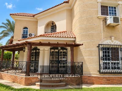فیلا 5 غرف نوم للبيع في الشيخ زايد، الجيزة - Sunny Mediterranean Villa with Terracotta Roofs. png