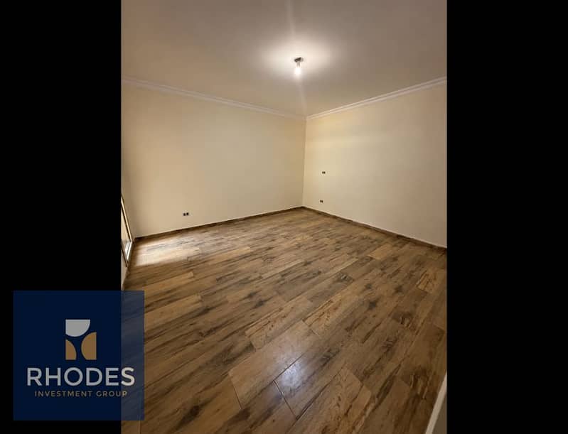 3 Empty Cream Room with Wood-Look Flooring. png