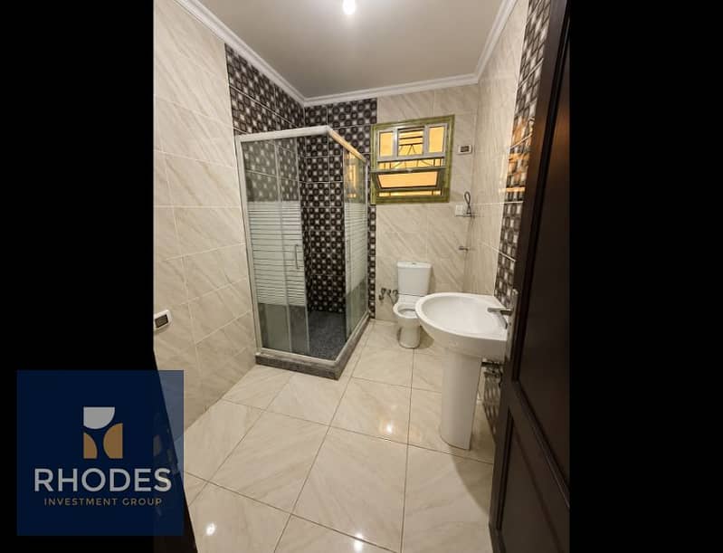 6 Modern Marble Bathroom with Glass Shower. png