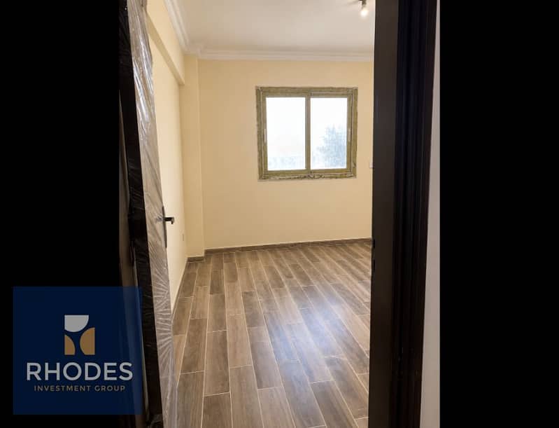 7 Renovated Empty Room with Bright Window. png
