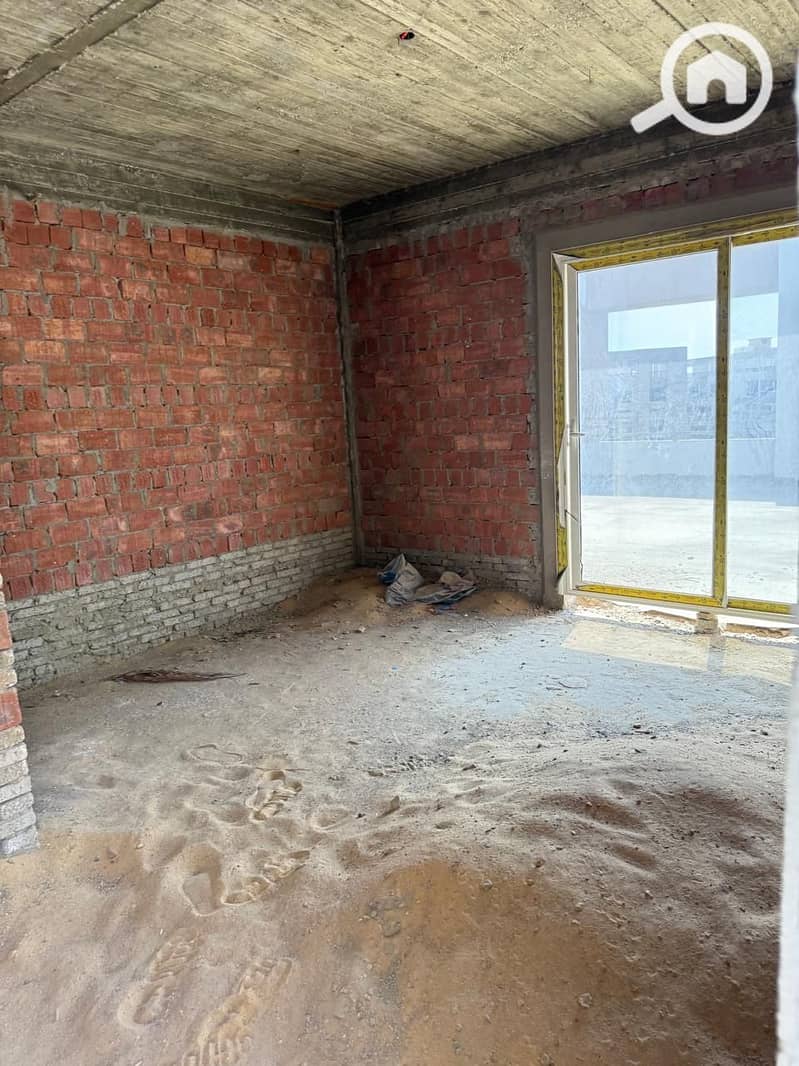 9 09-Unfinished-Roof-Room. jpg