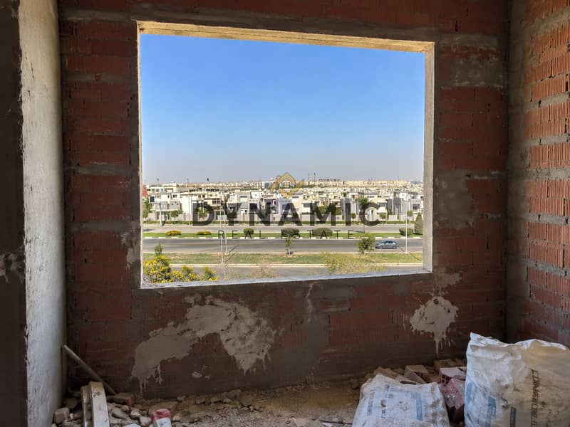 3 Unfinished Room Framing a Sunny Cityscape. png