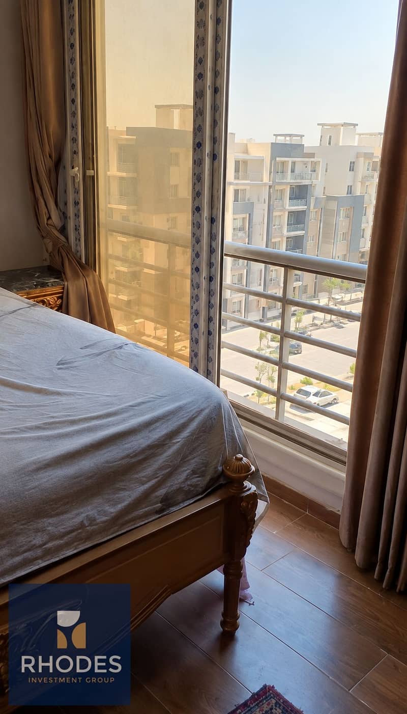 11 Sunlit Bedroom with Balcony View. png