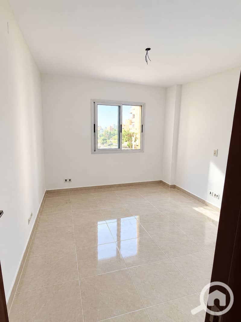 3 Bright Minimalist Room with Window Reflection. png