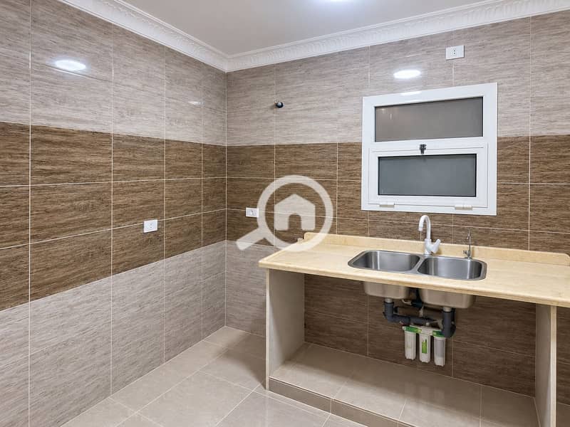 4 Clean Modern Tiled Utility Kitchen. png